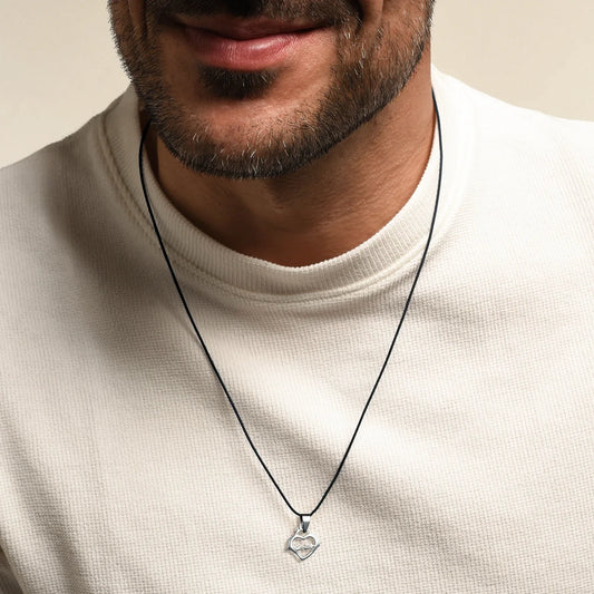 SACRED HEART OF JESUS NECKLACE - RUBBER CORD AND STEEL